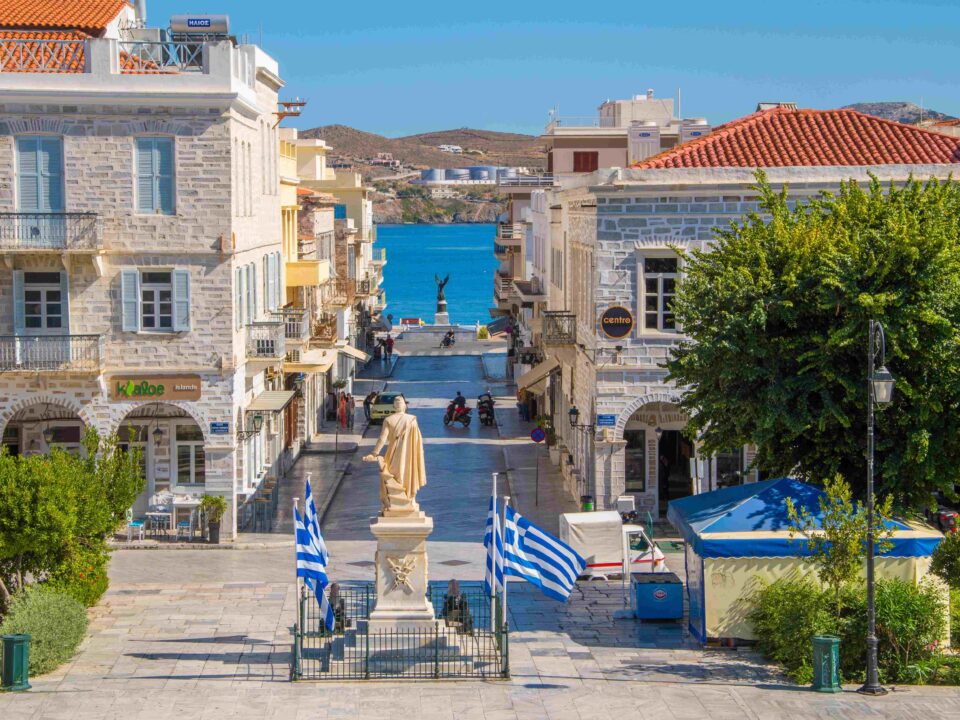 Central square or Miaoulis square with palm trees of Ermoupolis city in Syros island, Cyclades, Greece